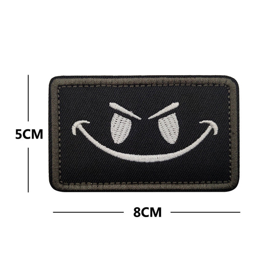Evil smiley embroidered morale patch 8 x 5 cm